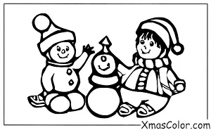 Christmas / Wintry Weather: A child building a snowman